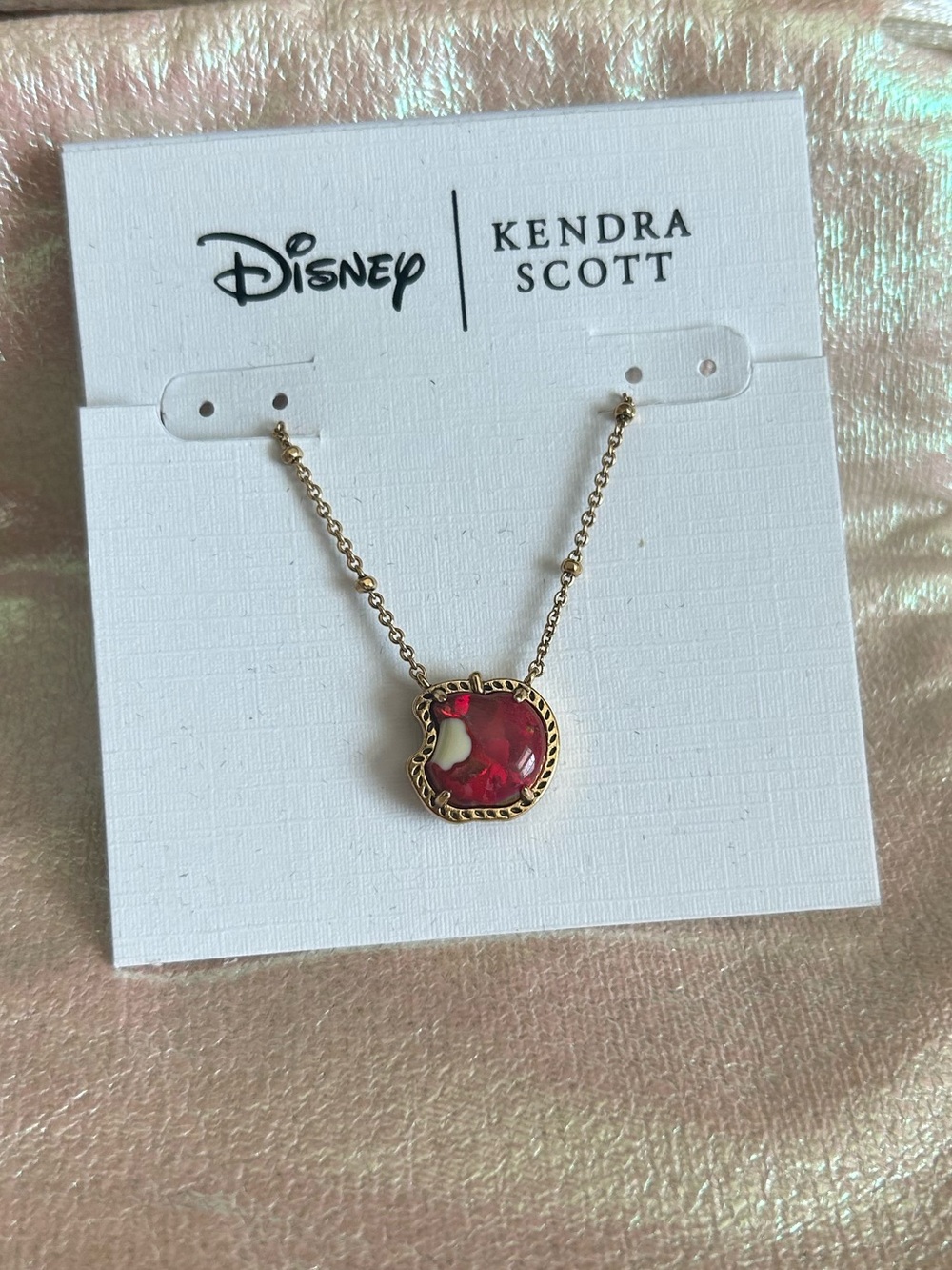 Kendra Scott Disney Snow White necklace features a bitten apple pendant - Picture 3 of 6